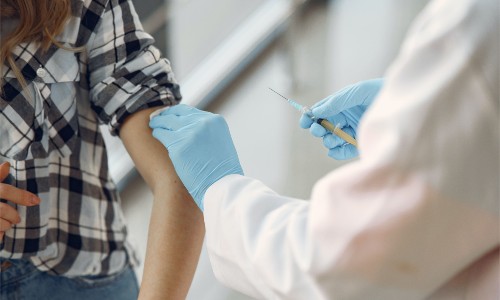 What should employers do when some employees are vaccinated and some are unvaccinated?